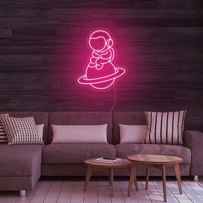 Astronaut Sitting on Planet - LED Neon Signs