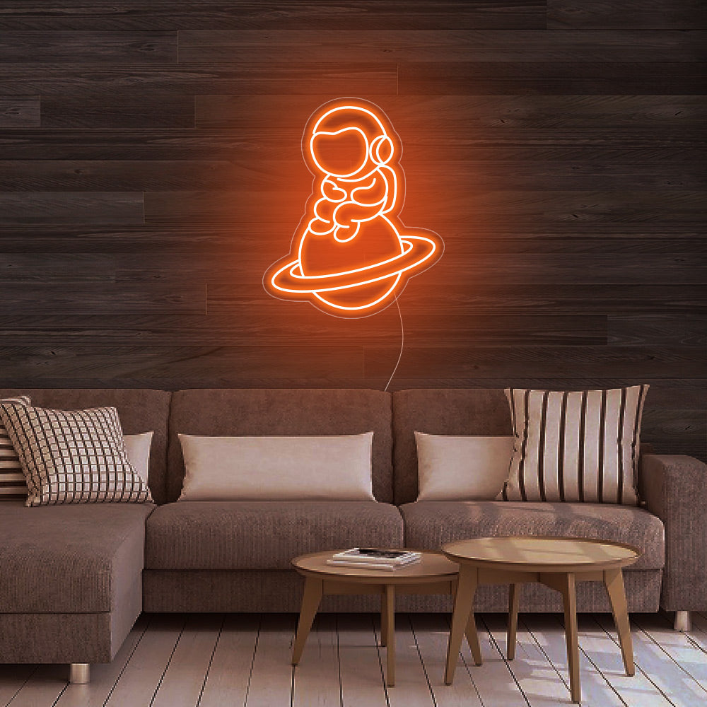 Astronaut Sitting on Planet - LED Neon Signs